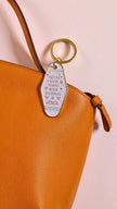 Book Shopping Motel-Style Metal Keychain
