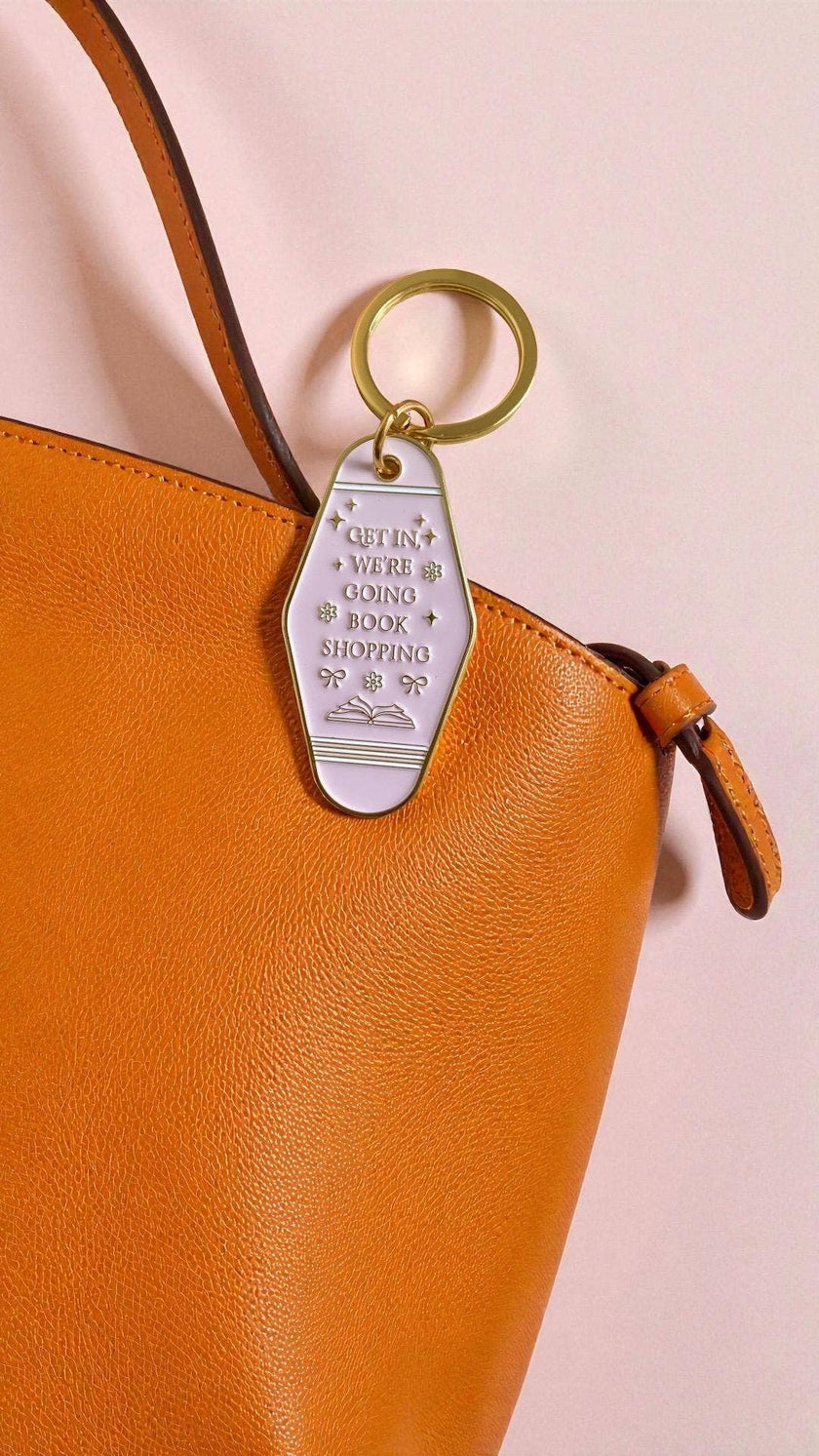 Book Shopping Motel-Style Metal Keychain