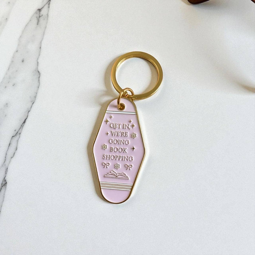 Book Shopping Motel-Style Metal Keychain