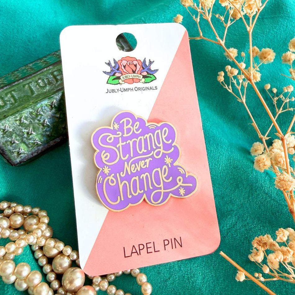 Be Strange Never Change Lapel Pin